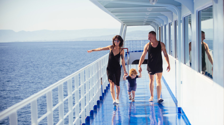 toddler holding hands on cruise