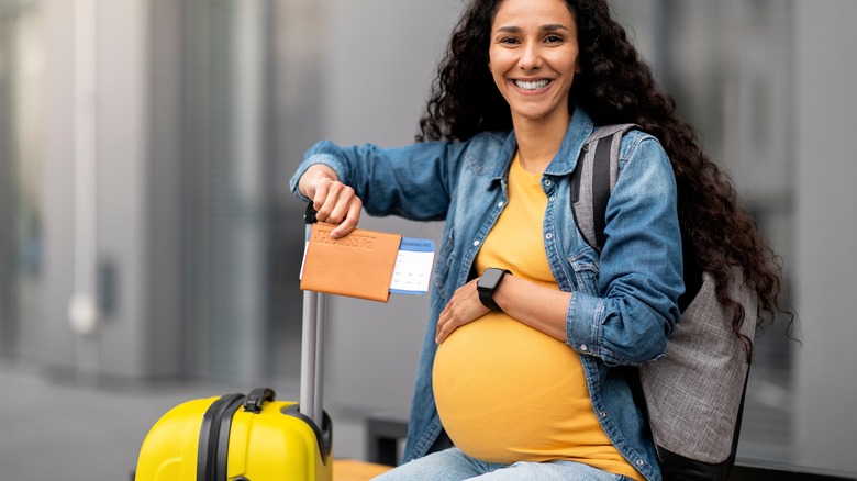 Pregnant woman with passport